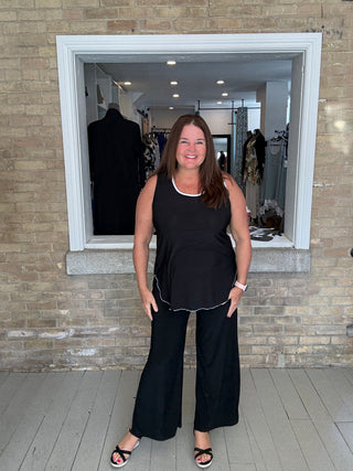 Sleeveless Tunic with curved hemline